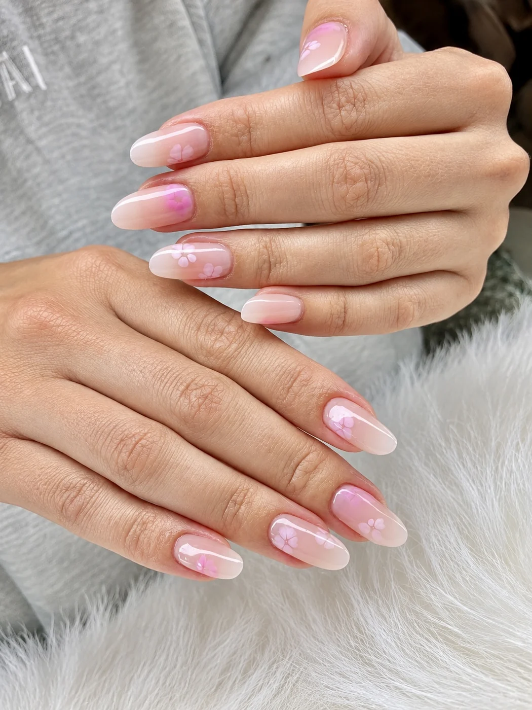 Russian manicure with pink ombré almond nails and tiny painted flowers by KC at AyuriNails Beauty Lounge, Poblacion Makati